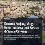 Kemarau Panjang, Warga Bogor Terpaksa Cuci Pakaian di Sungai Ciliwung